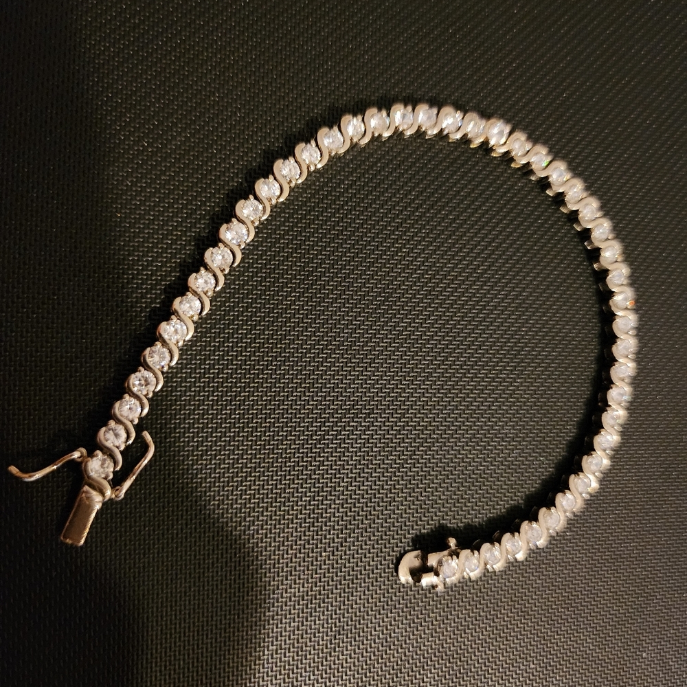 Tennis bracelet is 925